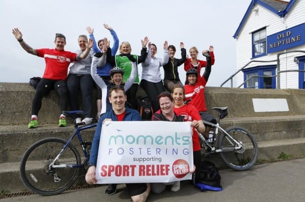  three people posing for the camera, holding moments fostering supporting sporting relief poster